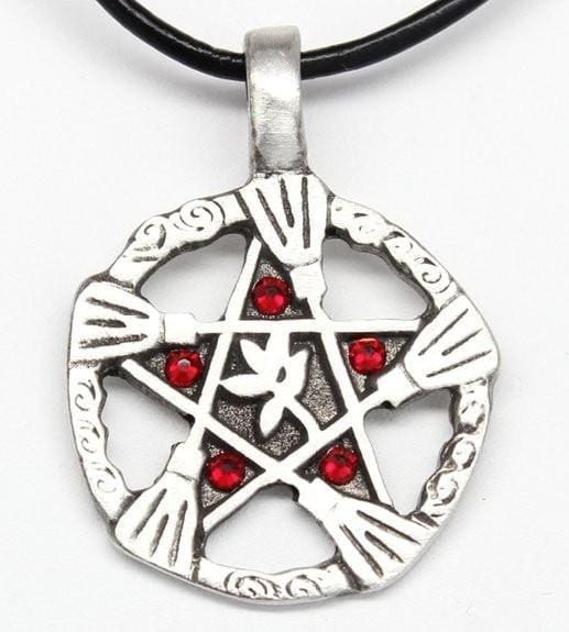 Product image of a pentacle with 5 brooms, 5 deep red garnet birthstone crystals, and a plant at the center and the necklace is attached to a leather cord.