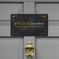 A WITCH Lives Here Hanging Door Sign